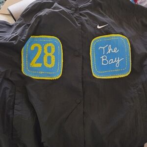 Nike Black Raincoat with Blue & Yellow Patch Accents